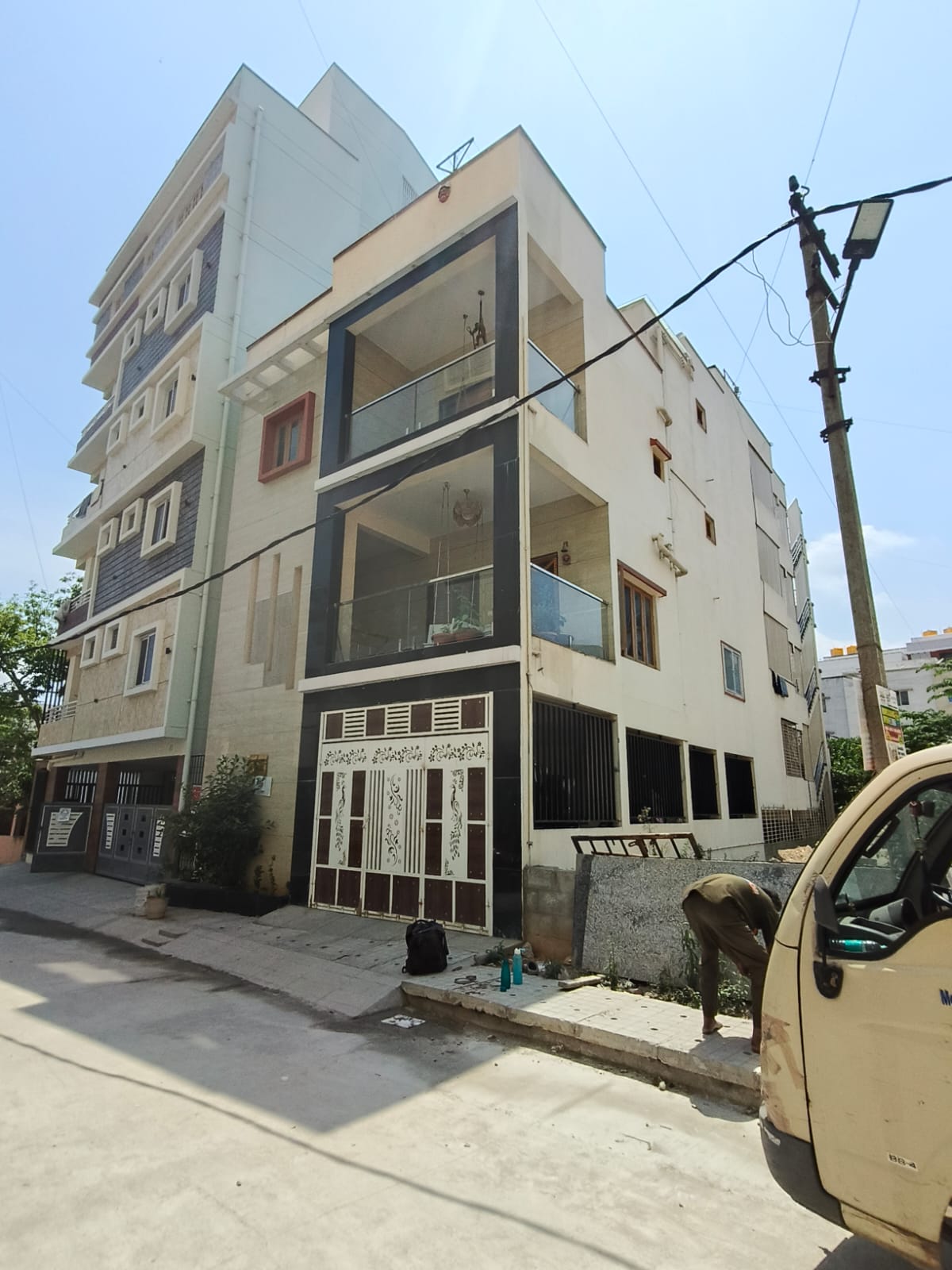 SAP Constructions contemporary home dark frame design Bangalore